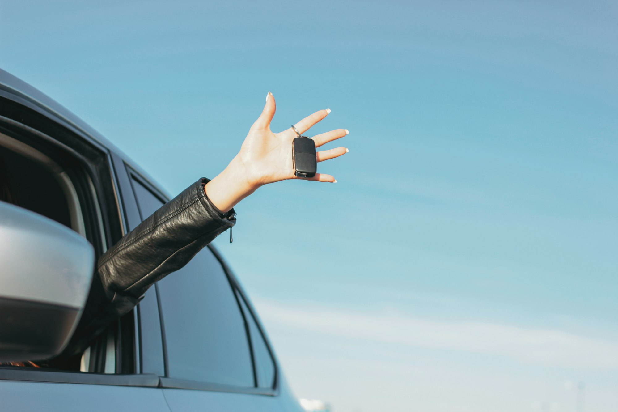 Woman with car key